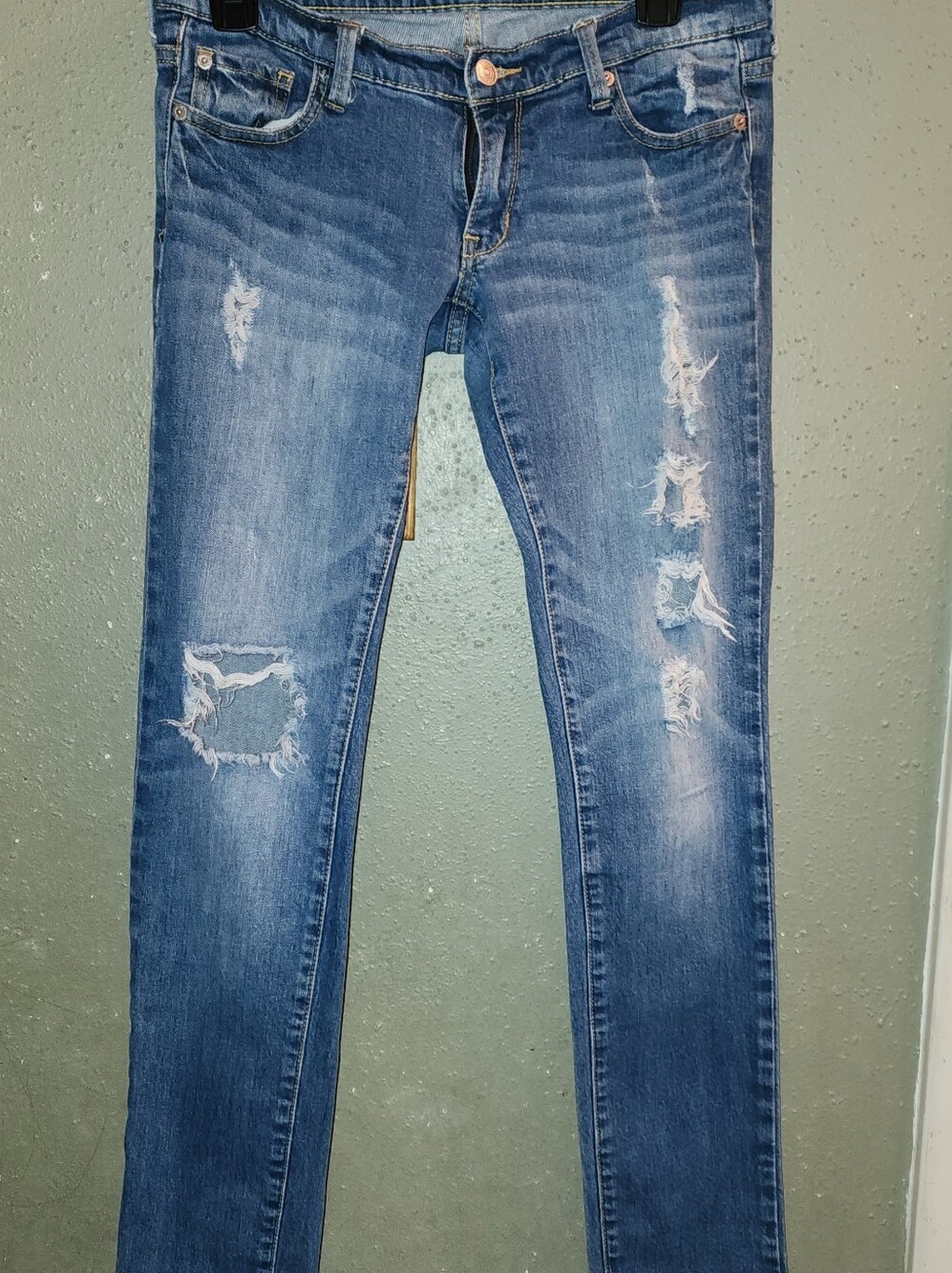 Distressed Blue Skinny Jeans